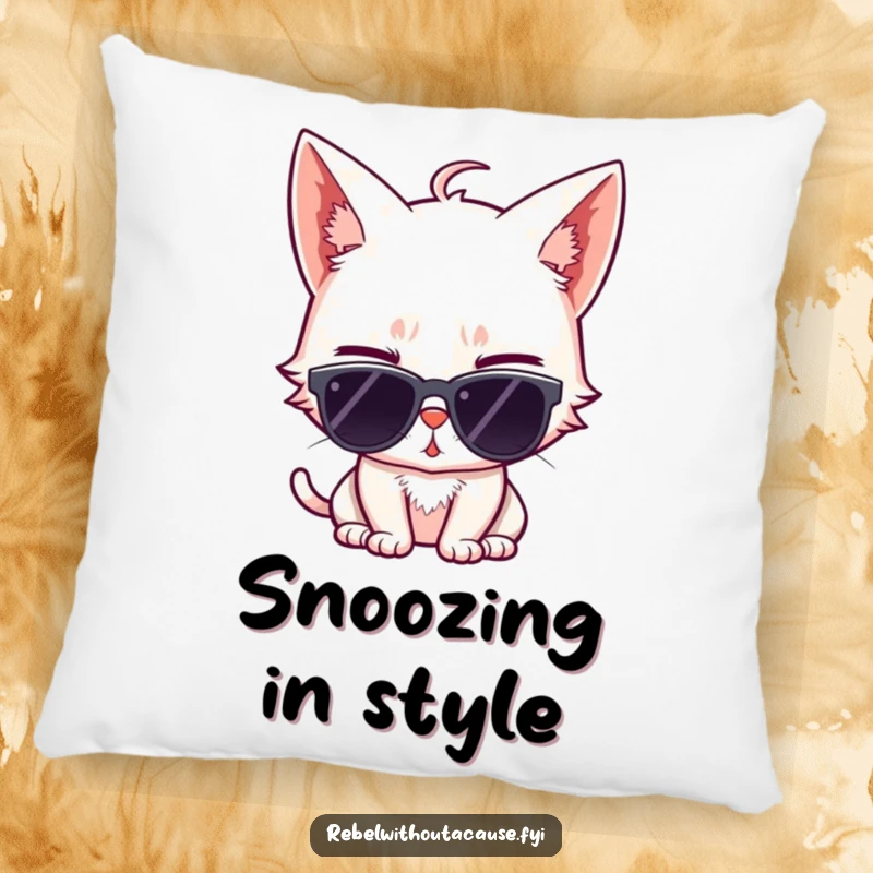 Soft, funny pillow showcasing a sassy cat wearing sunglasses and giving a wink, offering comfort with a cool, feline vibe.
