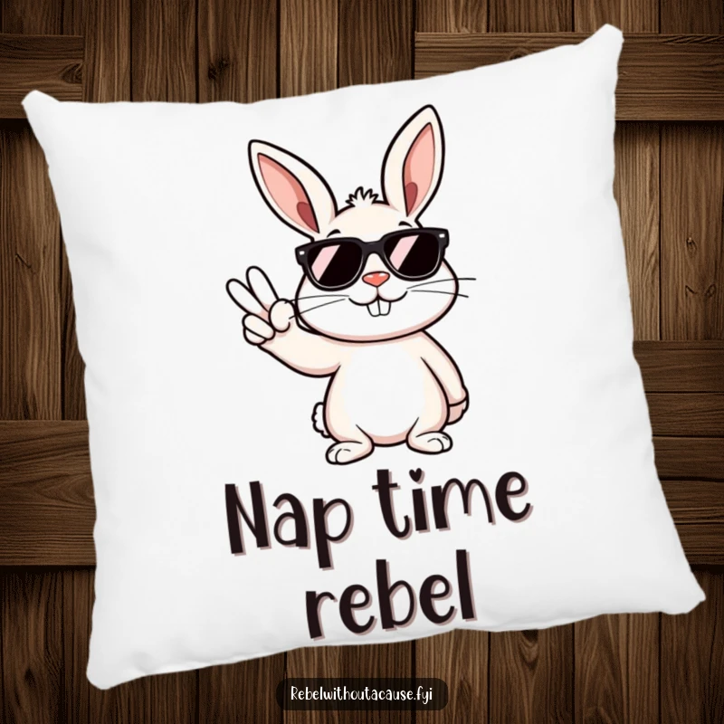 Funny bunny pillow with dark sunglasses, giving a peace sign with a smirk, adding comfort and humor.