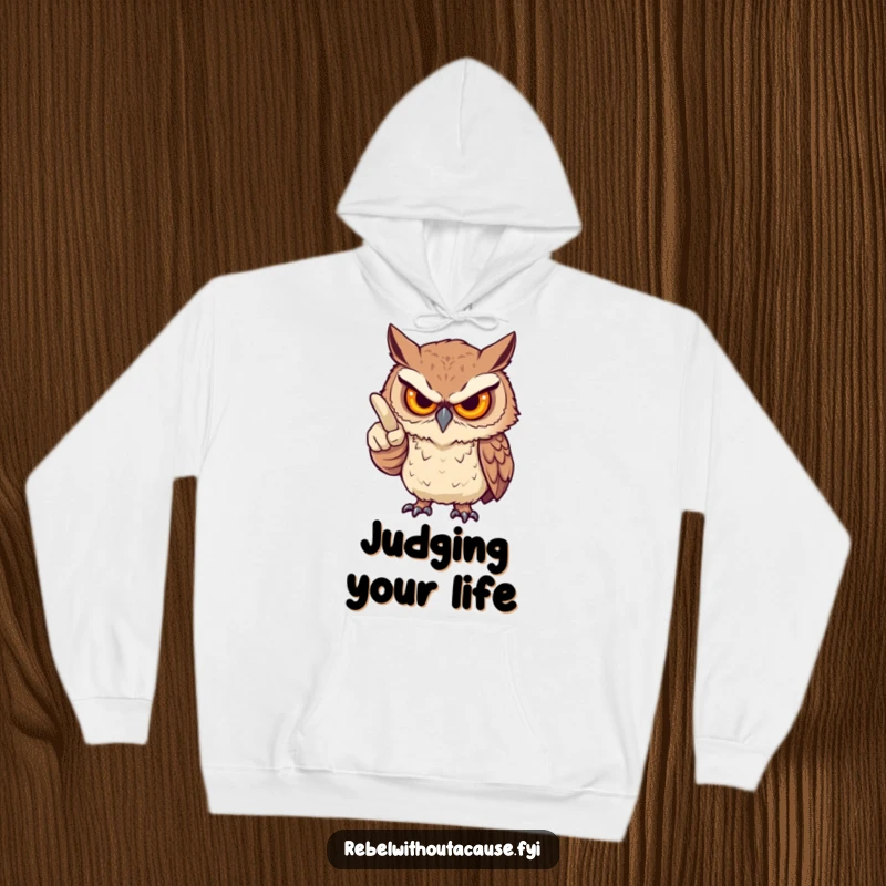 Funny hoodie with a fierce owl, stern but playful, pointing an accusatory finger, offering cozy judgment and humor, a perfect funny gift.