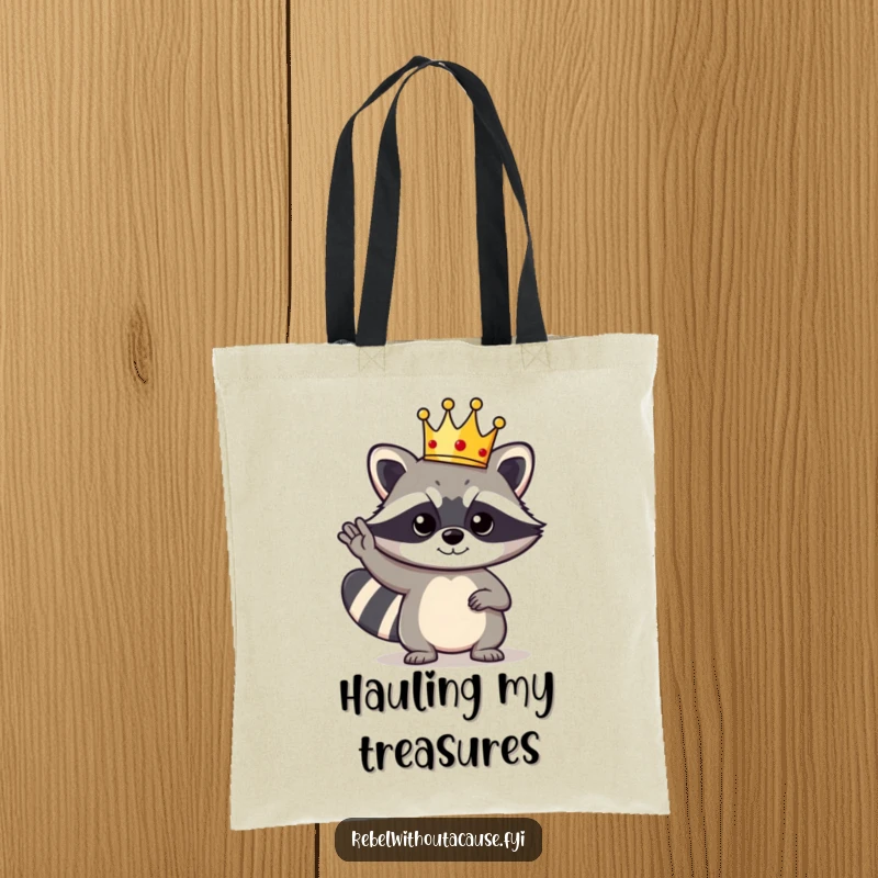 Funny Raccoon King Tote Bag: A bold raccoon character wearing a tiny crown gives a cool salute, ready for royal duties.